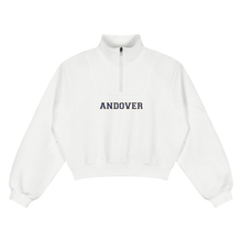 Load image into Gallery viewer, A white cropped quarter-zip sweatshirt with 'ANDOVER' printed in navy blue block letters across the chest, displayed on a clean white background.
