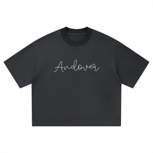 Load image into Gallery viewer, Black t-shirt on a white background
